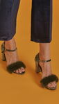 Akari Sandal is ankle strap sandal in faux olive rabbit fur. Open toe. Covered heel in soft velvet. 