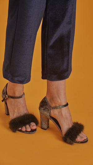 Akari Sandal is ankle strap sandal in faux olive rabbit fur. Open toe. Covered heel in soft velvet. 