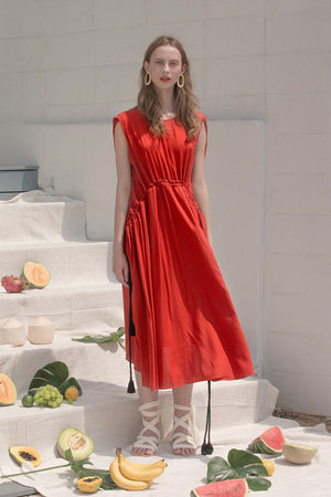 The Allen dress in boat neckline, sleeveless, adjustable cinching waist detailing with self sash belt. Pull on.