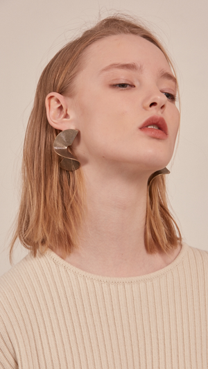 The Arley, a pair of sculptural gold-plated earring. Post back. 