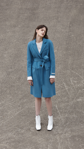 The Arya Coat is cut for a long-line silhouette that falls just below the knee. With a single-button fasting along front. Use the self-tie belt to flatter and define your waistline. Handmade. 