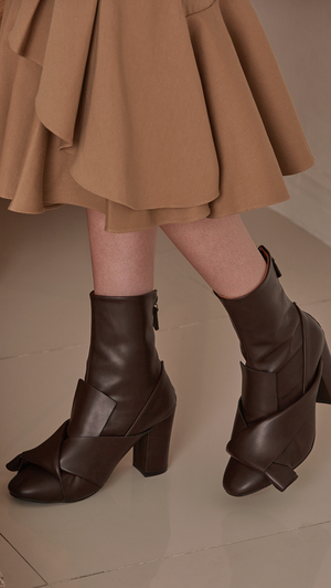 Atala Midi Boots in Dark Brown. Soft synthetic there upper, slouchy design in gathered origami top, almond toe and zip opening at back. 