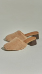 Bear Furry Slide in Beige Shearling. Shearling mule with large strap covered faux fur across toes. Slip on.