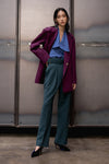 Suit wool jacket from Carlotta Jacket in deep violet. Notch lapel. Dropped shoulders. Left chest pocket. Long sleeves with slits at cuff. Hook and eye closure at front.