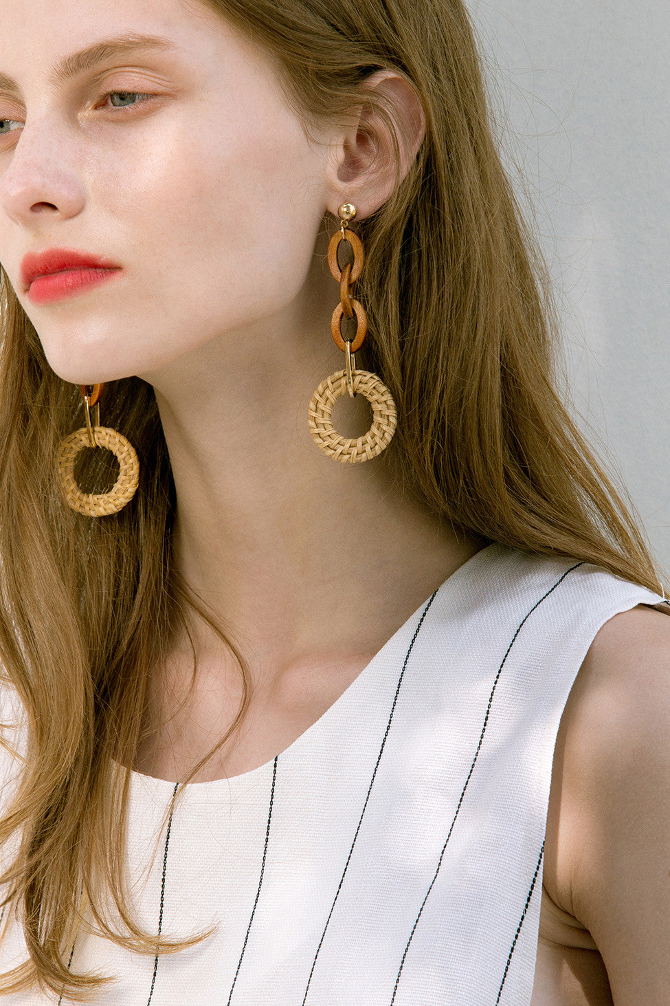 The Ellipse, a pair of bamboo loops earrings. Gold metal post back. Sold as a set.