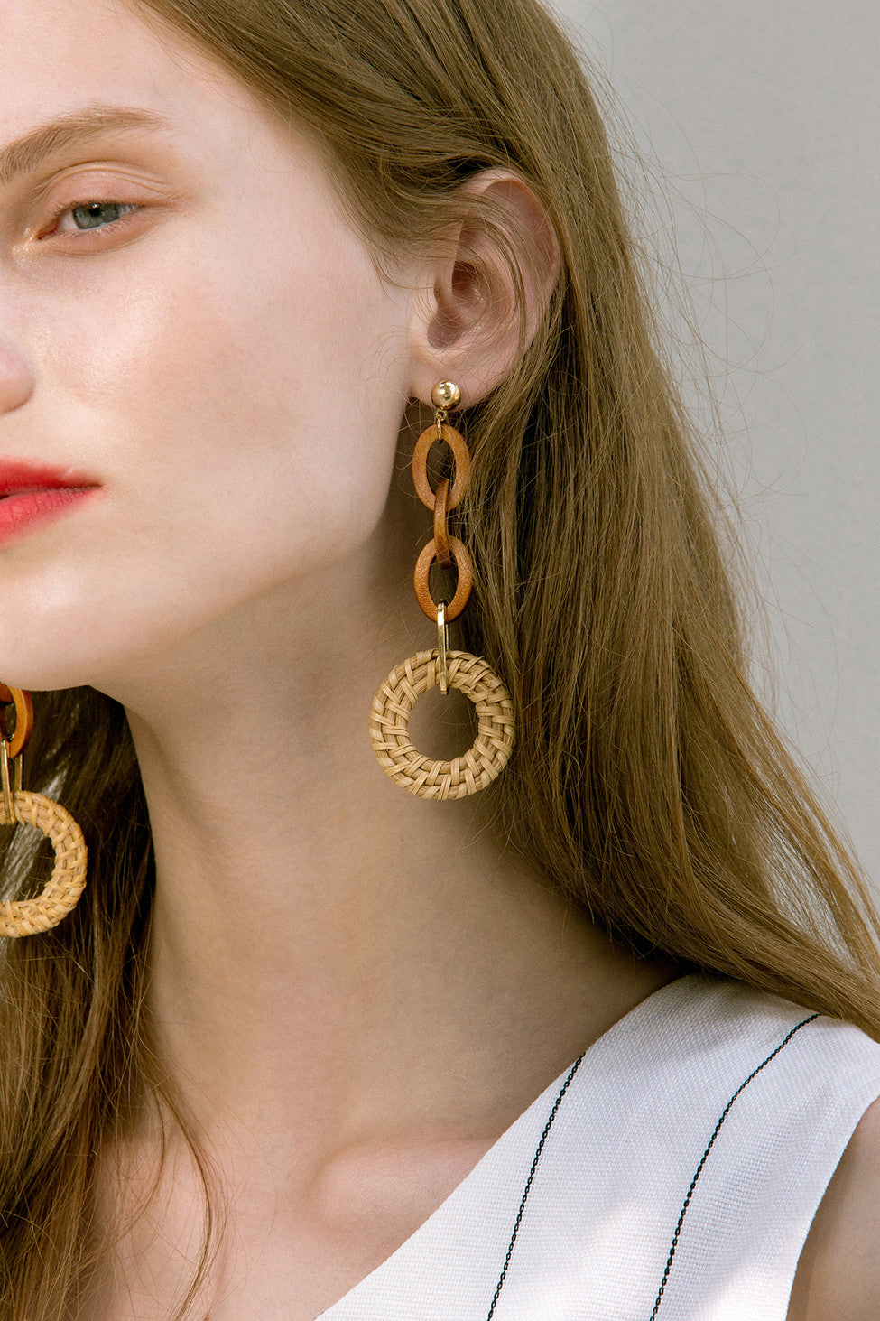 The Ellipse, a pair of bamboo loops earrings. Gold metal post back. Sold as a set.