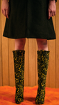 The Gaucho Knee Boots in yellow/black graphic. Zip fastening along side. Knee length.