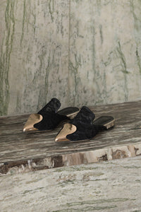 The Helios featuring an almond toe with gold brass detail in Black. Lightly padded footbed. 