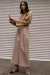 The Kasumi easy trousers in beige featuring high rise, gathered elastic paperboy waist with non-detachable tie-belt. One-seam back pockets. Pleats from front waist. Concealed zip closure at side. Relaxed straight leg. Full-length. Casual fit.