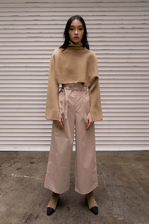 The Kasumi easy trousers in beige featuring high rise, gathered elastic paperboy waist with non-detachable tie-belt. One-seam back pockets. Pleats from front waist. Concealed zip closure at side. Relaxed straight leg. Full-length. Casual fit.