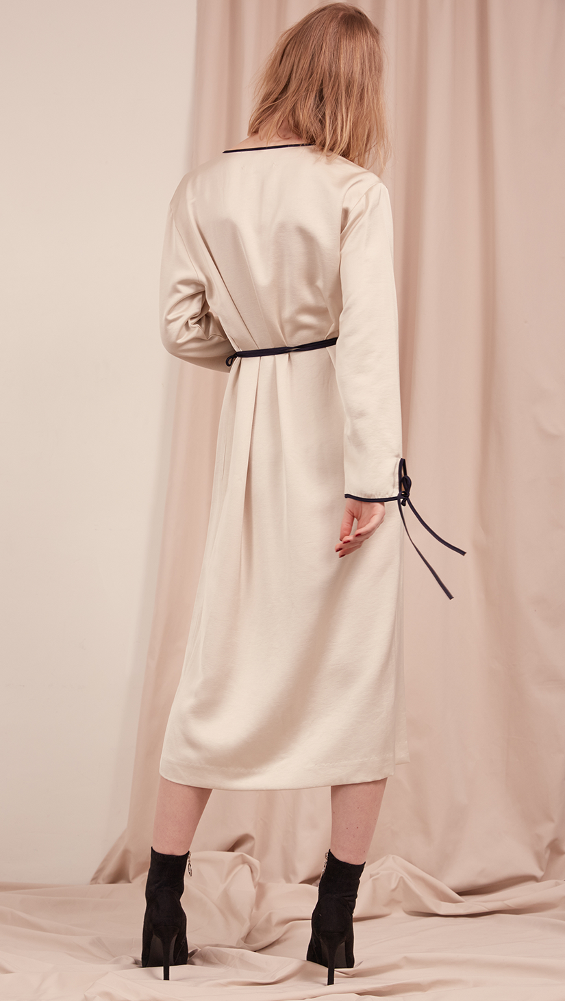 The Gabe Dress in Ivory. With wrap front, self-tie at waist. Lightweight. Super soft feel. Midi length, particularly long in length.