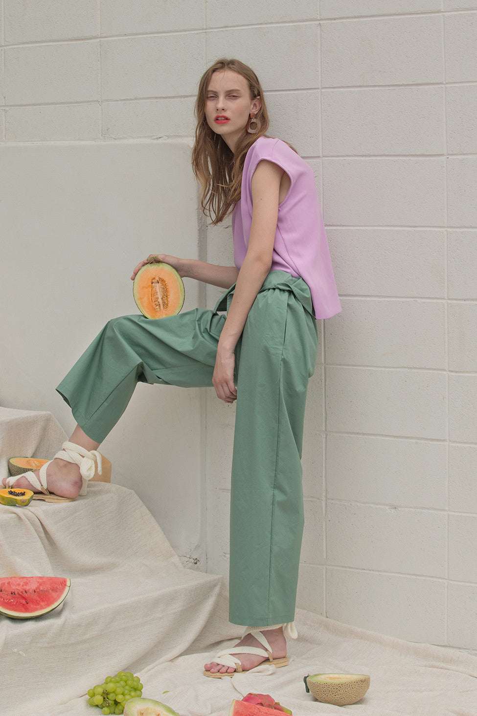 The Lassie Pant in pale green featuring elastic waistband, two slant pockets. Lightweight.