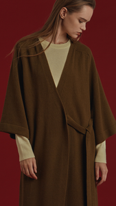 Oversized long sweater coat in khaki felted 100% wool. Long dolman sleeves, open front, drop shoulder, no pockets. Roomy fit. Detachable tie with buttons. Handmade.