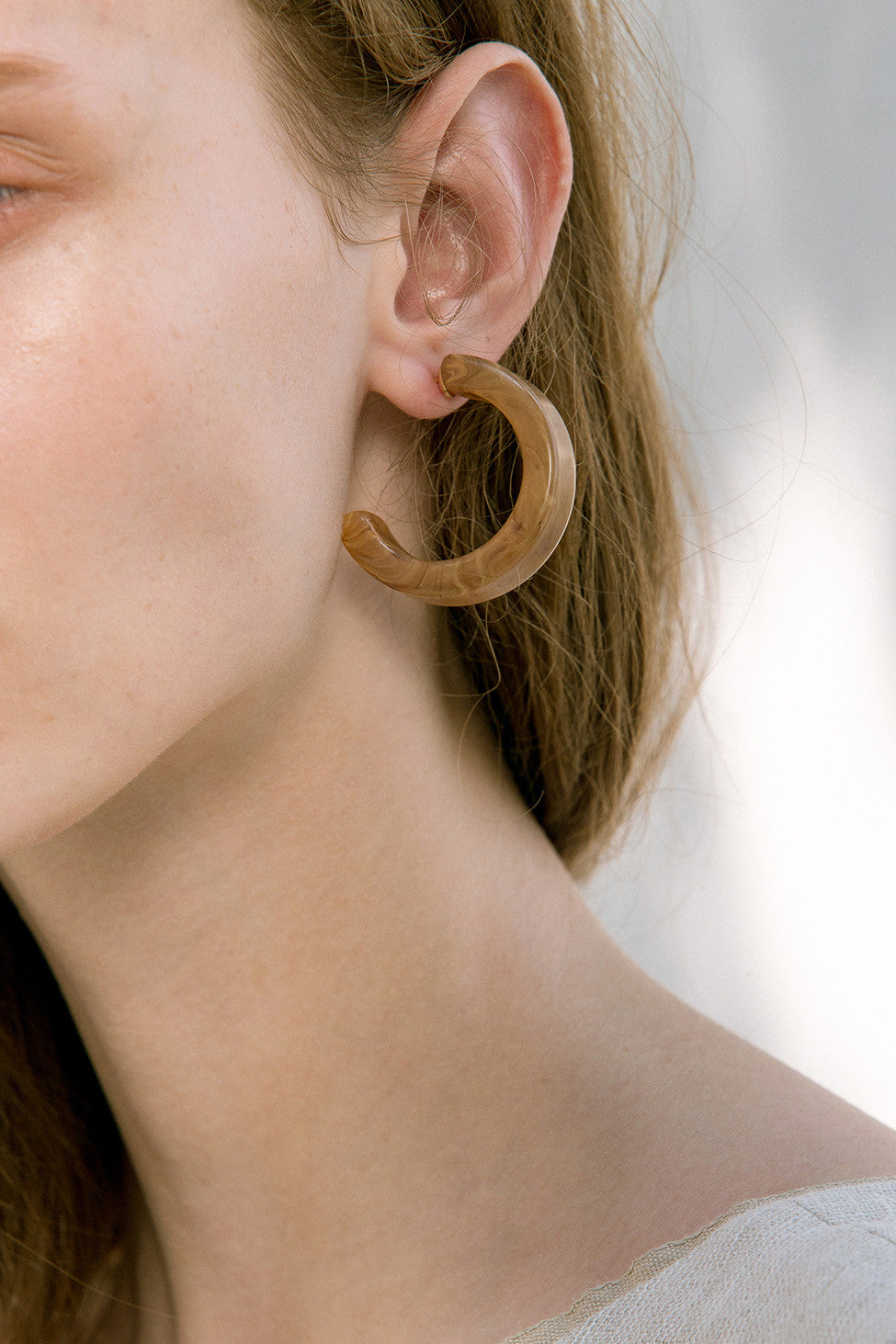 The Lucia, a pair of acetate hoop earring. Metal post back. Sold as a set.