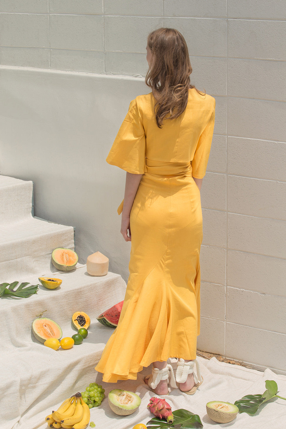 The Martyna Skirt in Yellow featuring ruffle pleats in fluted edge, concealed side zip closure, high waist in ankle length. Partial lined.
