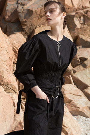 The Myrtle Dress in Black featuring scoop neckline, three-quarter ballon sleeves. Corset-inspired gathered elastic waistline with detachable self-tie fastening belt.