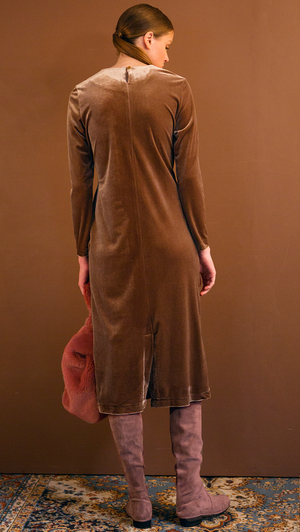 The Palma Dress in lustrous velvet brown. With round neckline, concealed zipper closure at back, long sleeves, attached self-tie strap. Relaxed fit. Stretchy fabric.