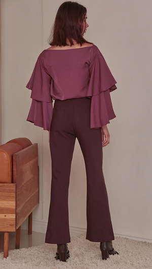 Rocha Top in Wine. Silky-Soft feel. Wide neckline with tiered ruffles along the voluminous sleeves. Round hem. Pull on. Designed to frame shoulders. Cut for a loose fit. 