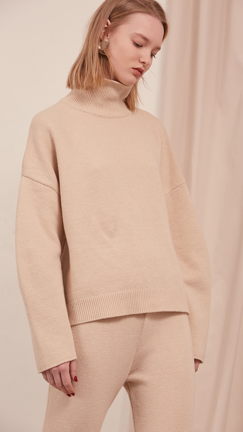 Roscoe Knit in Cream Beige. Oversized sweater with turtleneck, drop shoulder. Pull on.