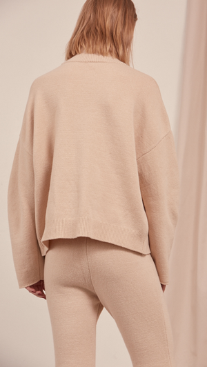 Roscoe Knit in Cream Beige. Oversized sweater with turtleneck, drop shoulder. Pull on.