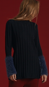 Rosendale Knit in Dark Navy. With a faux shearling cuffs in contrasted colour and button closing detail, backless with extra long self-tie closure. Open rib details. Designed to be slightly relaxed fit.