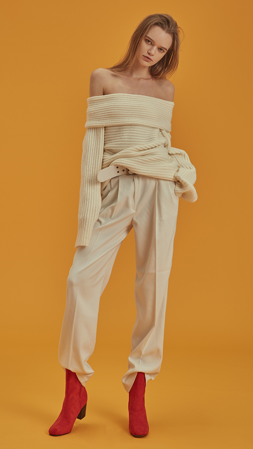 Willow Pant, a detachable belted wide leg trouser in ivory. High waisted raglan pleated, wide belt, particularly long in length, two front pockets. Designed to be straight.