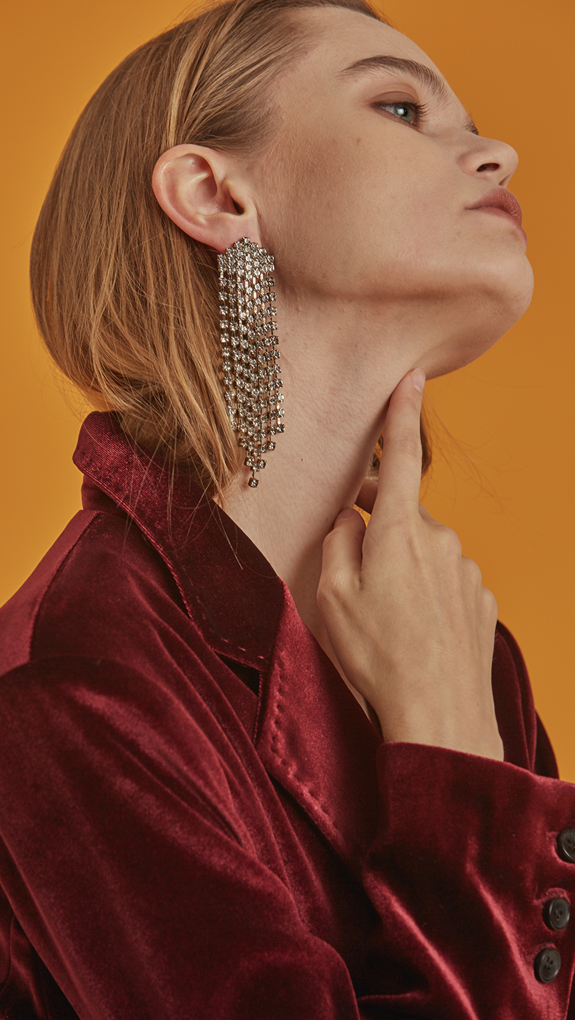 Rylette Earring, a set of long gem crystal. Long single earring in silvertone chain. One earring, not sold as pair.