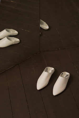 Selma Babouche in White with cowhide leather soles and folded backs slide, pointy toe. Slip on.  