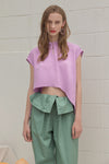 The Sofie Top in Lilac featuring cap short sleeves, asymmetric cropped hem, keyhole closure at back. 