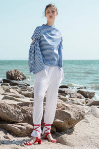 The Rossellini pleats pant in White featuring drawstring waistband. Straight fit.