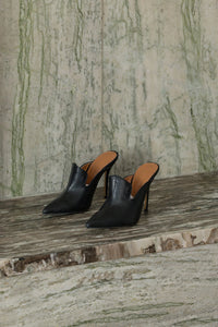 The Vavarta heel in Black. Almond toe. Slip-on design.