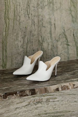 The Vavarta heel in White. Almond toe. Slip-on design.