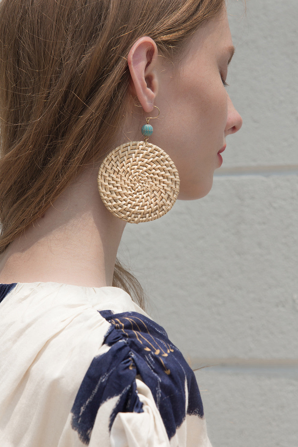 The Vero, a pair of bamboo earring in exaggerated oval-shaped. Gold metal post back. Sold as a set.