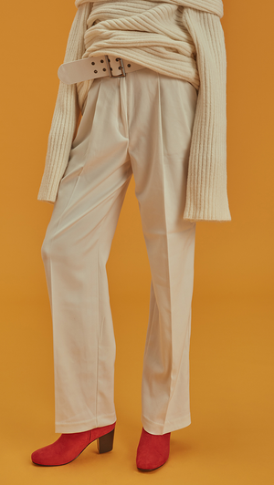 Willow Pant, a detachable belted wide leg trouser in ivory. High waisted raglan pleated, wide belt, particularly long in length, two front pockets. Designed to be straight.