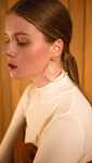 The Yuko, a pair of double layered circle earring. Post back. 