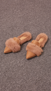 Yulie Furry Slide in Brown Shearling. Shearling mule, created entirely with faux ribbit fur. Slide loafers with a almond square toe, padded leather foot bed and rubber soles. Slip on.  