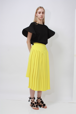 Alula Skirt in Peach/Yellow. Two-tone skirt from a contrasting combination of matte crepe and bright bold color. 