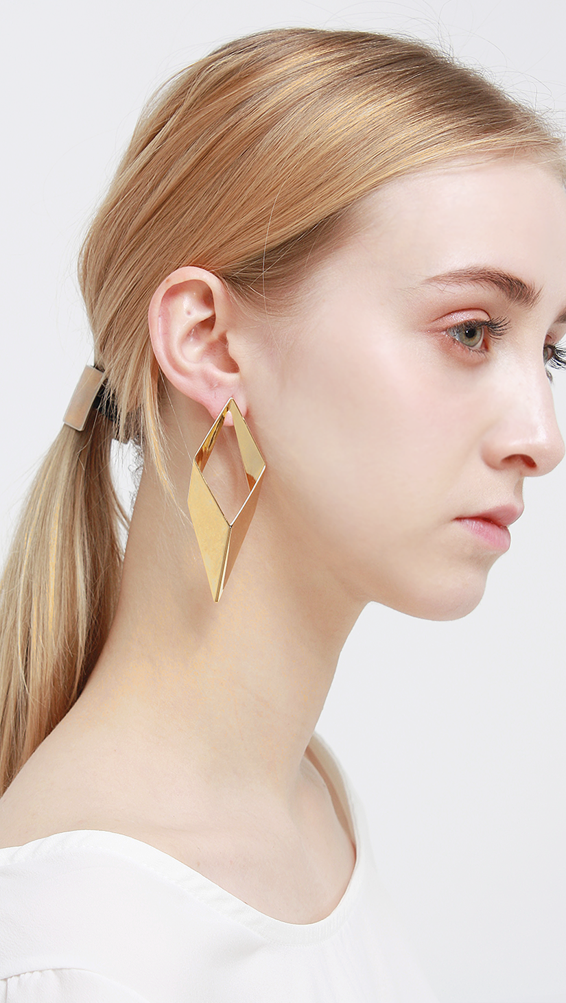 Swirl Earring in Petal gold earrings.